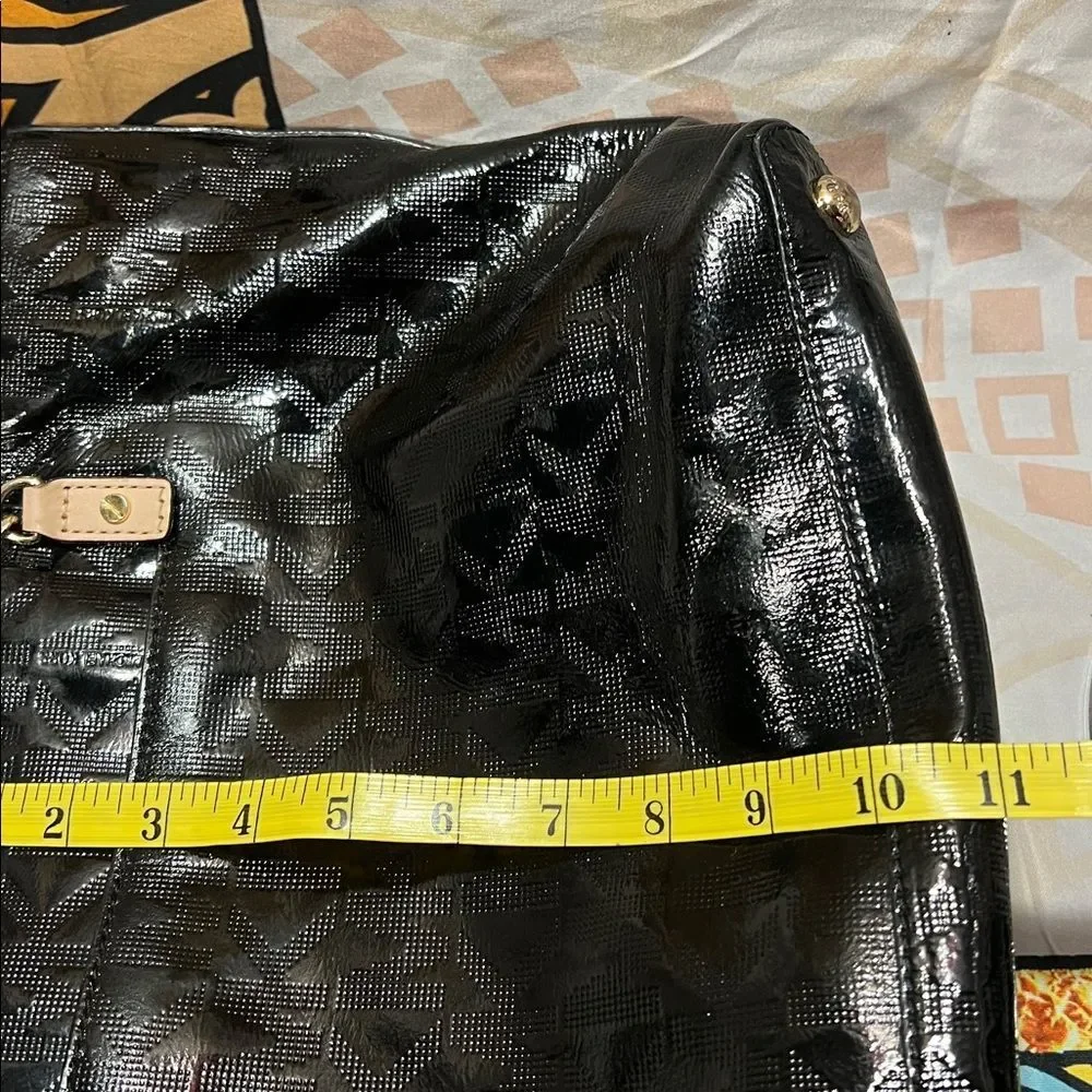 Michael Kors Jet Set Chain Tote in black patent leather with gold hardware.